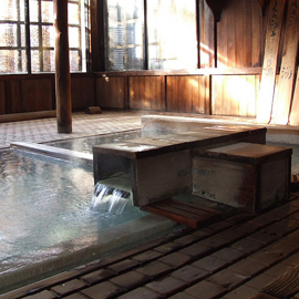 Onsen & Ryokan: traditional party wearing yukata robes at a hot springs resort